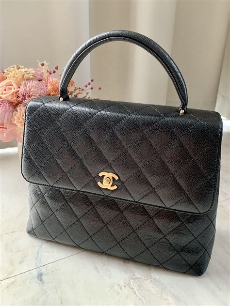 chanel vintage turnlock handbag|chanel vintage handbags price.